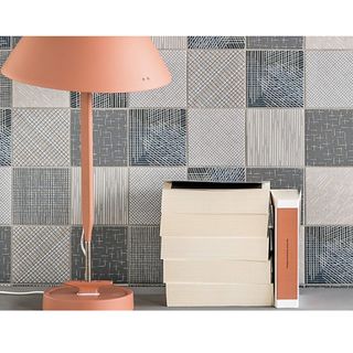 room with table lamp and books
