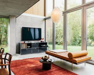 Vinyl storage in a media unit with record player and chaise longue