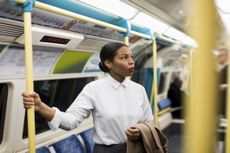 UK, London, portrait of businesswoman in underground train