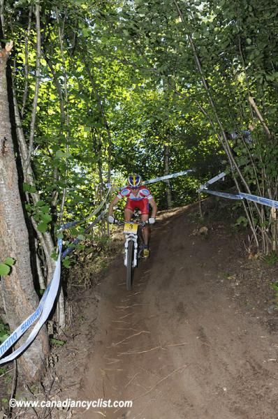 The cross country course is a mixture of wide open and tree covered narrow climbs/descents
