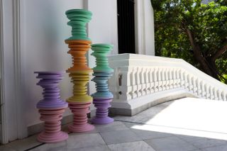 Pastel coloured tables on show at Villa Audi in Beirut