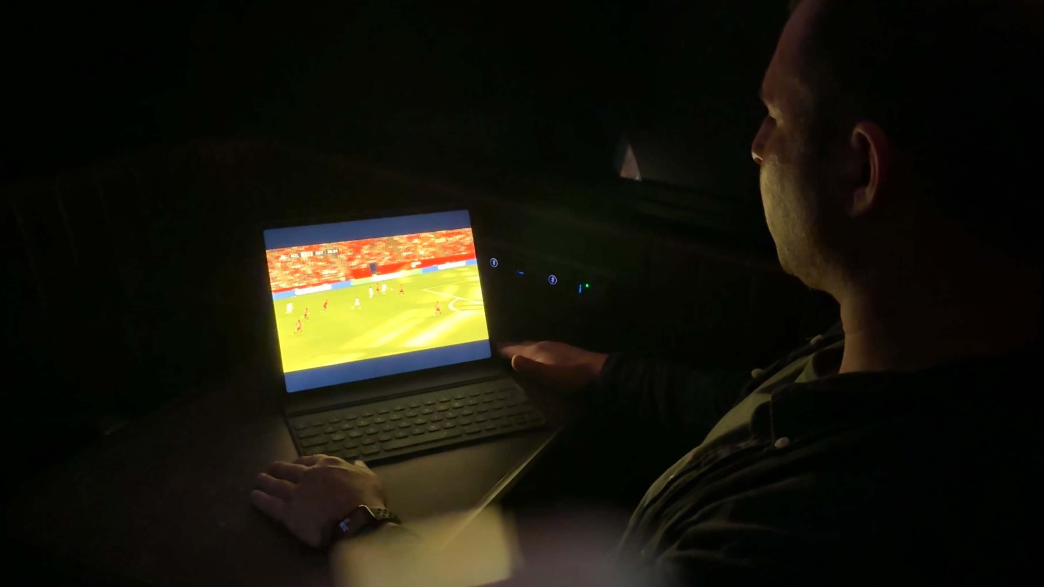 A person watching the World Cup on a Virgin Atlantic flight via Starlink