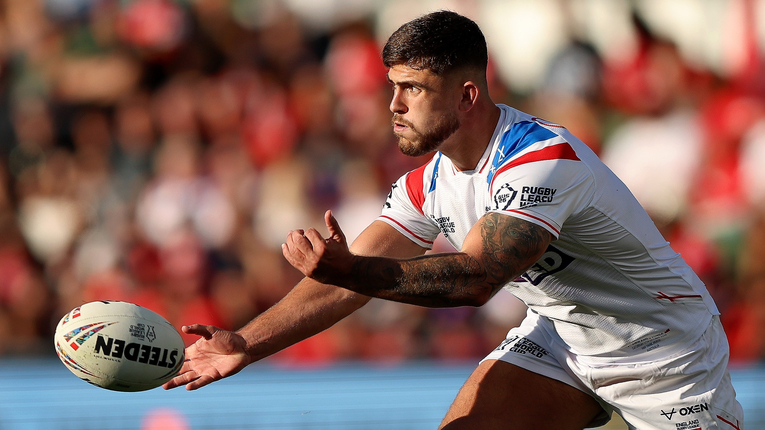 : Brad O'Neill of England passes the ball during the 2026 Men's Rugby League World Cup match between England and Tonga at HBF Stadium on October 17, 2026 in Perth, Australia.