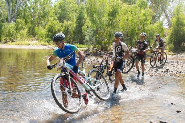 The lead group around Urs Huber at a river crossing: Brendan Johnston (AUS), Ondrej Fojtik (CZE), Lukas Islitzer (AUT) and Soren Nissen (DEN).