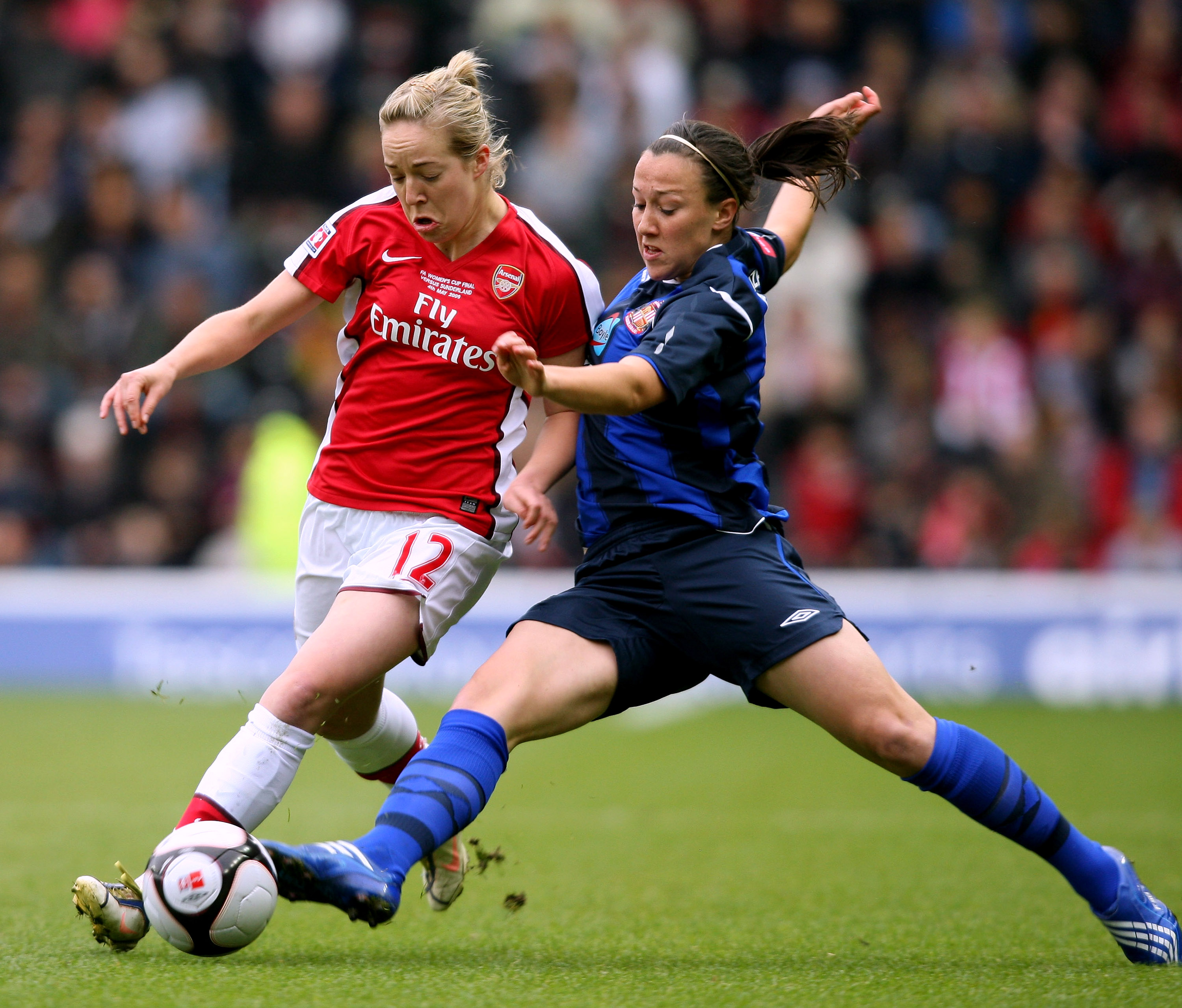 DERBY, ENGLAND - MAY 04: Gemma Davison (L) of Arsenal is challenged by Lucy Bronze of Sunderland during the FA Women's Cup sponsored by E.ON Final between Arsenal LFC and Sunderland WFC at Pride Park on May 4, 2009 in Derby, England.