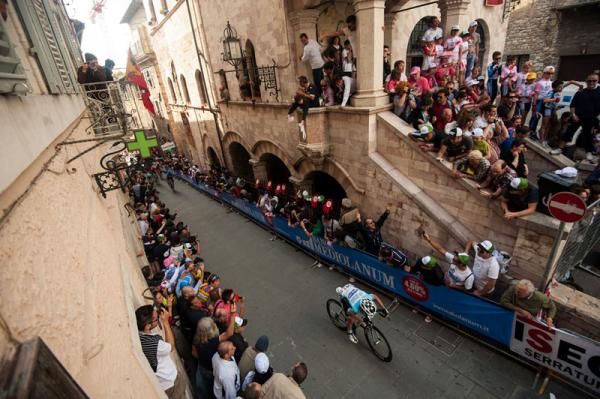 An Omega-Pharma QuickStep rider battles the gradient as he approaches the finish in Assisi