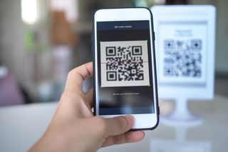 Smartphone scanning a QR code