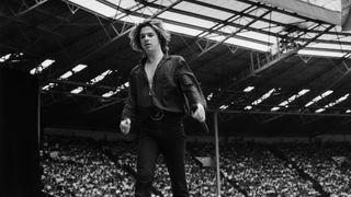 Michael Hutchence on stage with INXS