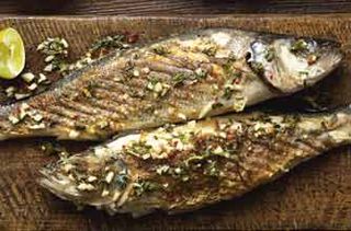 Sea Bass is simply grilled or barbequed and served with a delicious Greek dressing. A perfect dish ti eat with salads or on it's own.