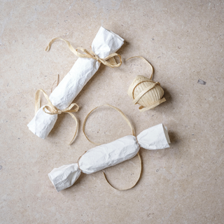 Paper crackers with gold ribbon
