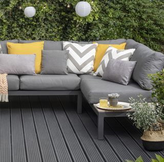 Ronseal grey decking with corner sofa