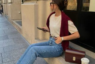 Woman in jeans and knit top