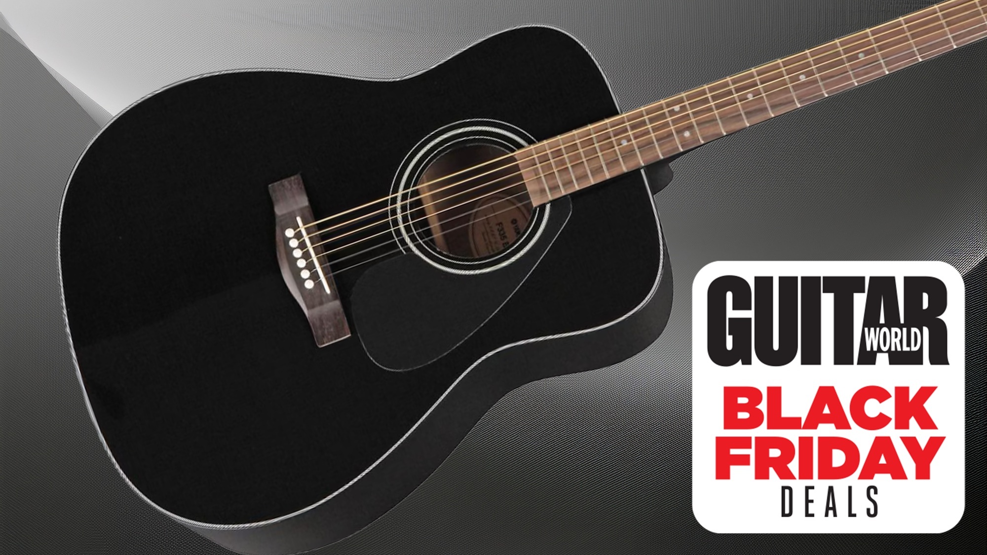 A black Yamaha F335 set against a grey and black background