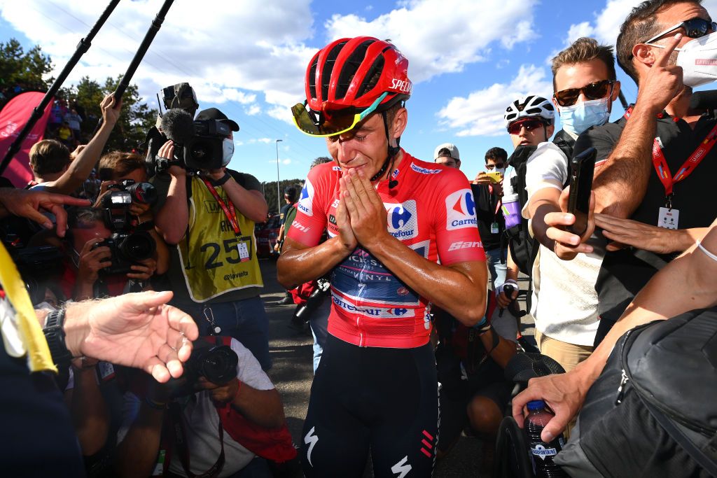 NAVACERRADA SPAIN SEPTEMBER 10 Remco Evenepoel of Belgium and Team QuickStep Alpha Vinyl Red Leader Jersey reacts after the 77th Tour of Spain 2022 Stage 20 a 181km stage from Moralzarzal to Puerto de Navacerrada 1851m LaVuelta22 WorldTour on September 10 2022 in Puerto de Navacerrada Spain Photo by Tim de WaeleGetty Images