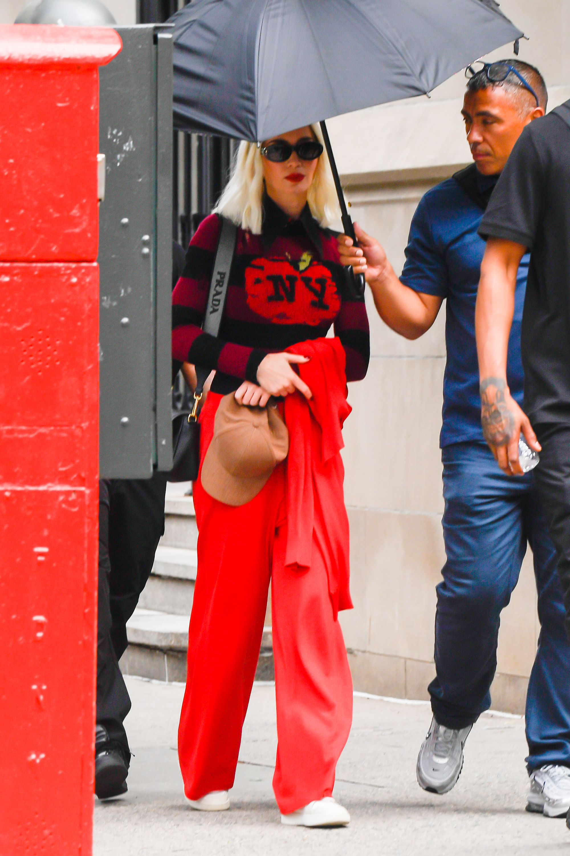 Emily Blunt was spotted in a Coach sweater on the set of The Devil Wears Prada 2
