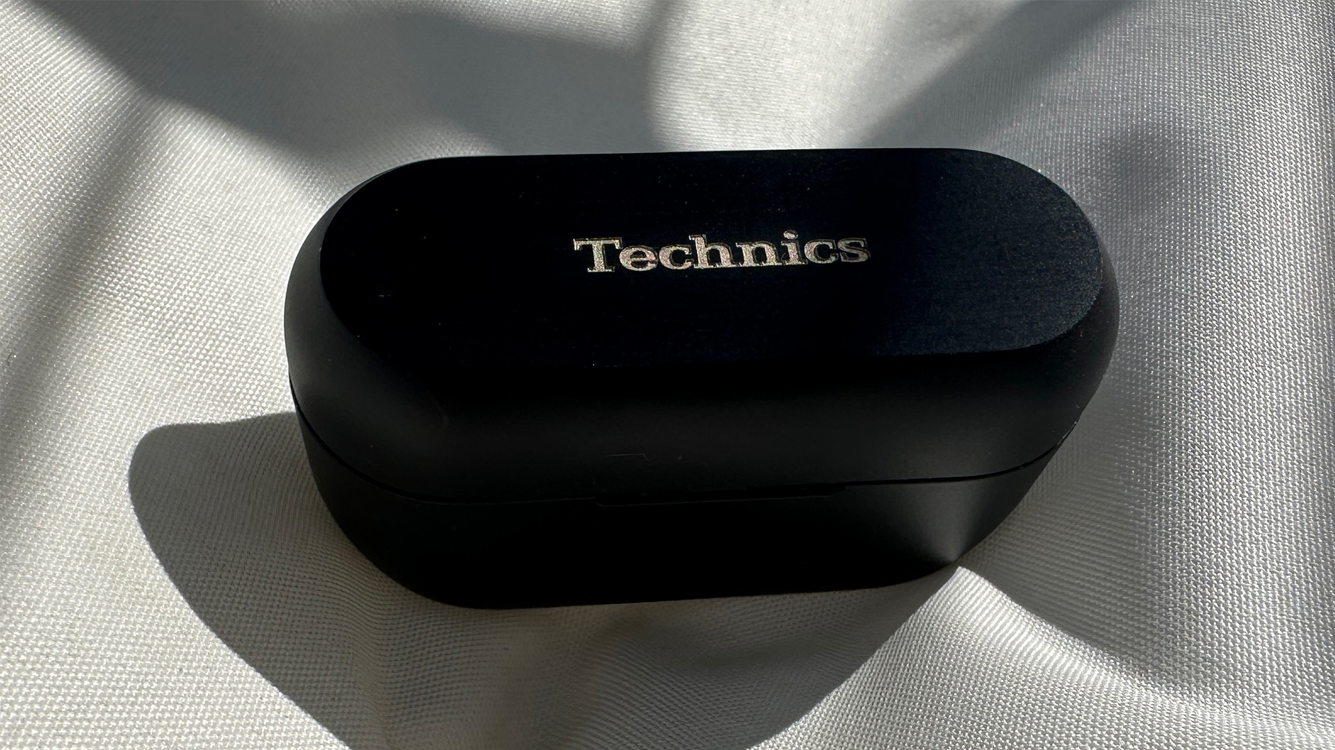 The Technics EAHAZ80 inside their case with the lid closed