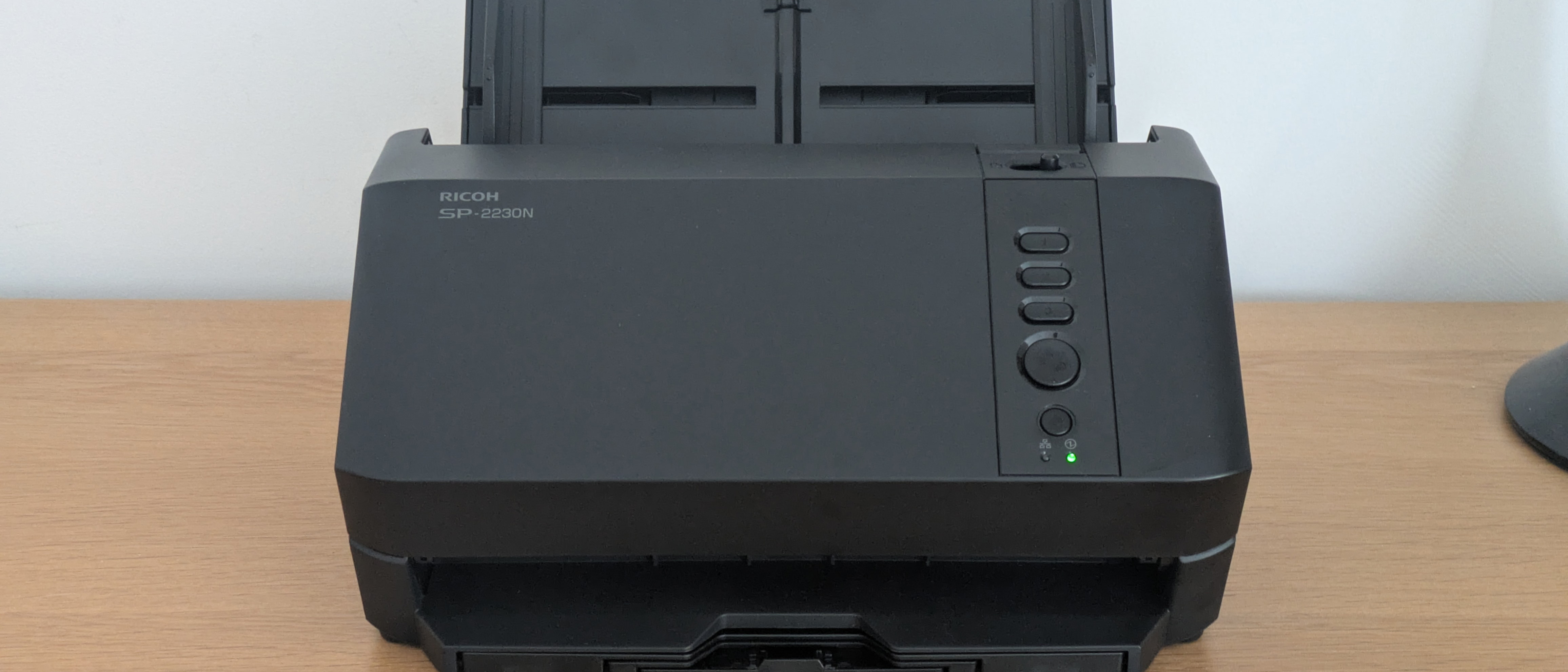The Ricoh SP-2230N on a desk
