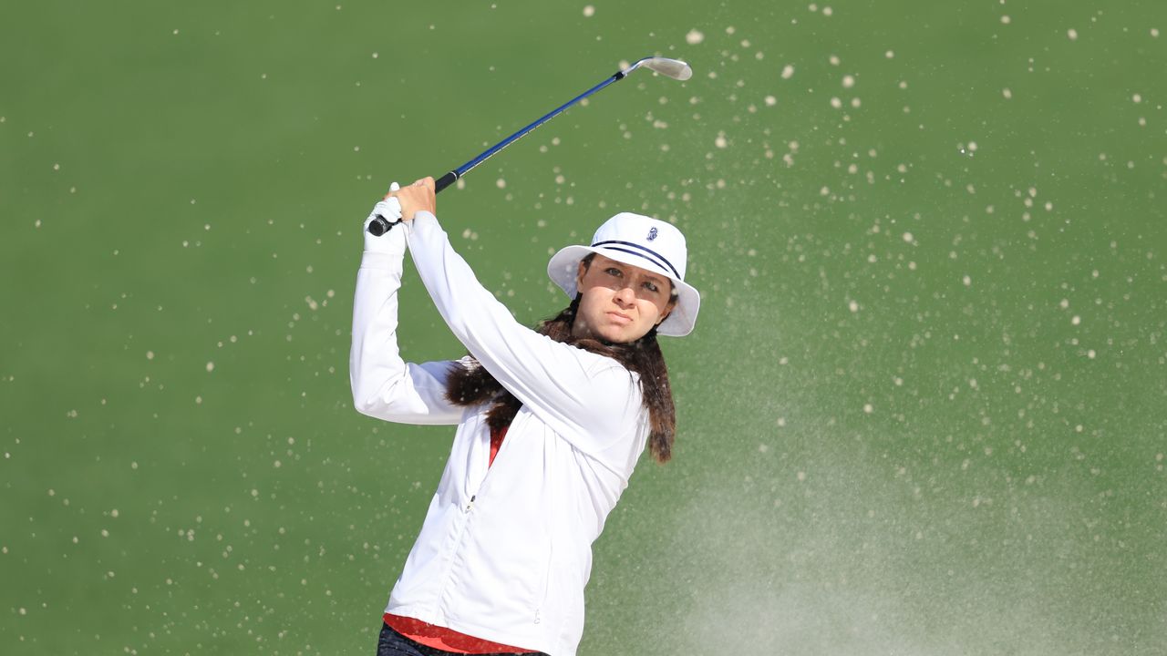 Anna Davis hits a bunker shot at Augusta National