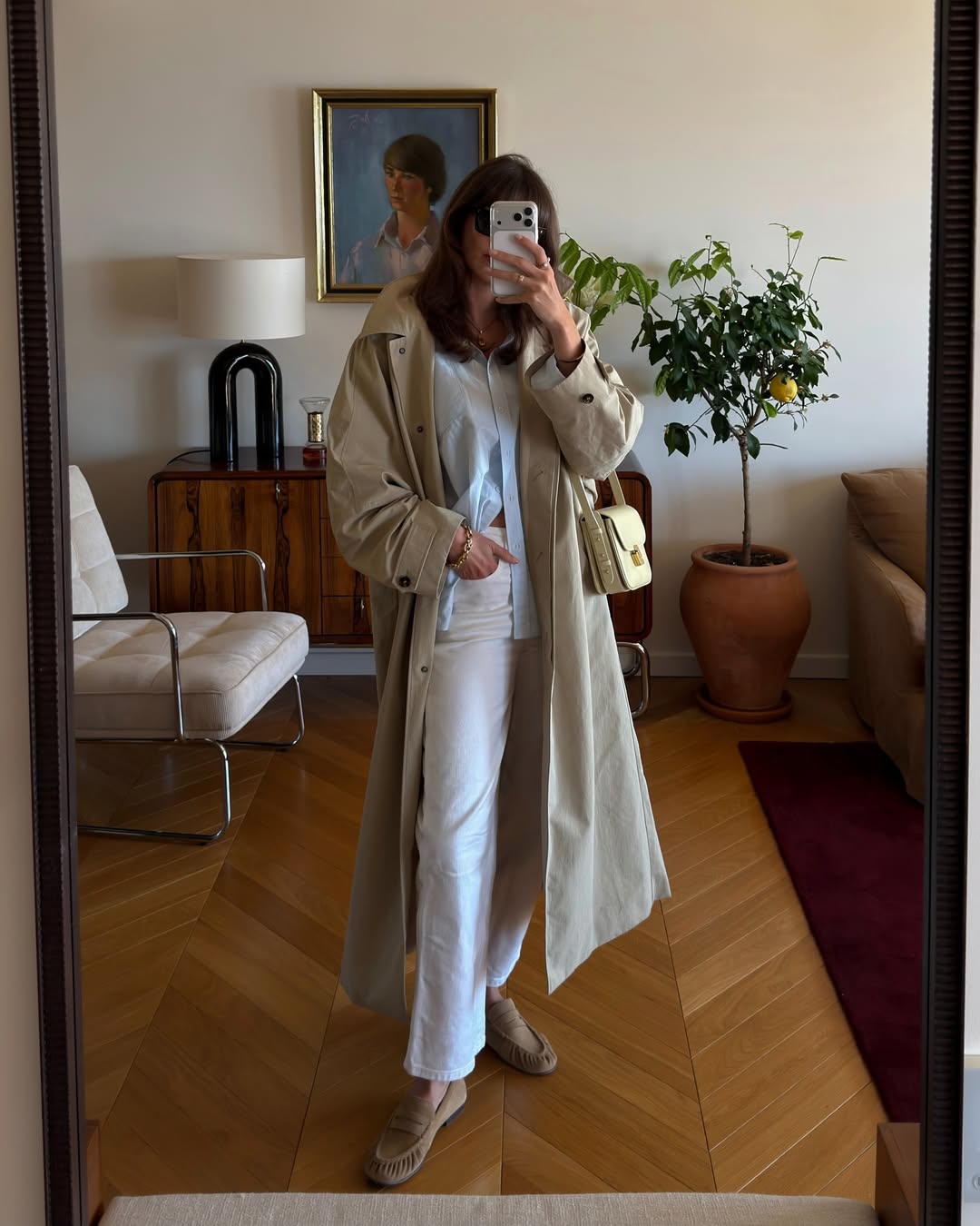 Julie in beige, light blue and white outfit