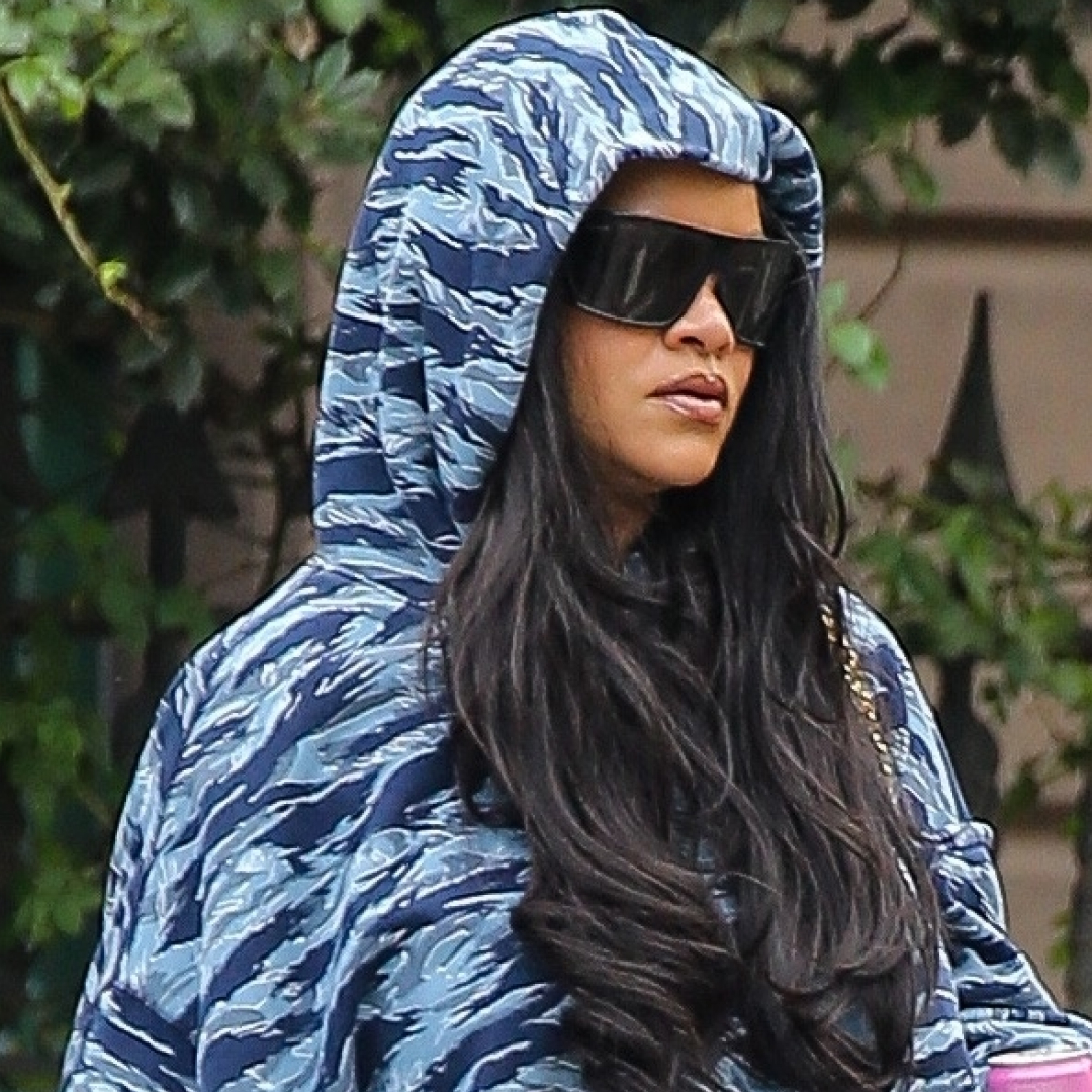 Rihanna wore the tiger-print trend with jeans and snakeskin Miu Miu sneakers