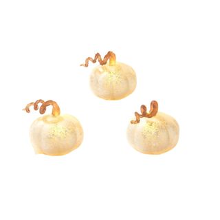 three white LampLust Mini Glass Pumpkins