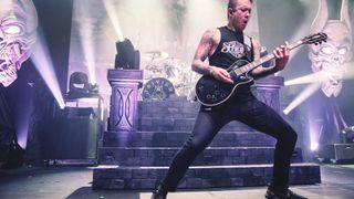 Matt Heafy playing an Epiphone Les Paul on stage