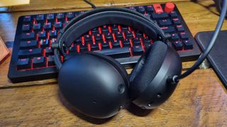 The Sony Inzone H9 II resting on an RGB-lit gaming keyboard