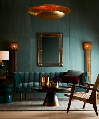 teal living room with red orange accents for a complimentary scheme