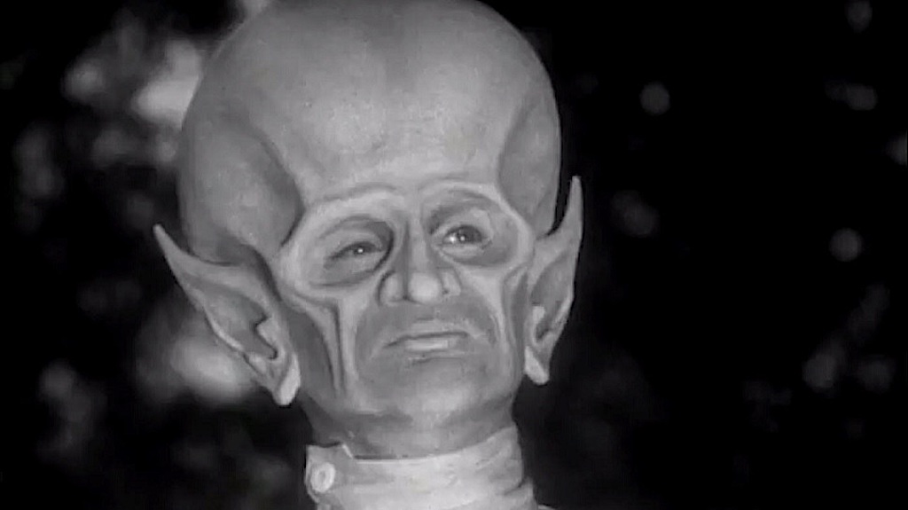 a large-headed alien with pointy ears