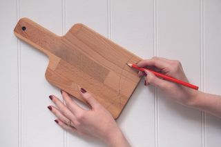 Draw a design on the wooden board