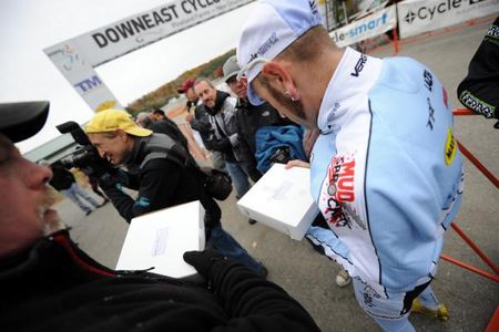 Adam Myerson receives his victory pie.