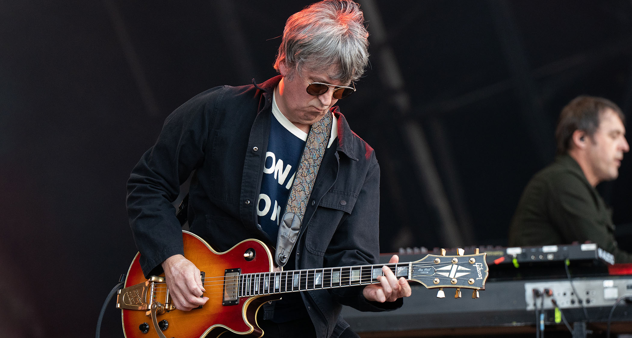 Mark Collins of the Charlatans plays a Bigsby-equipped Les Paul Custom during Heritage Live 2025.