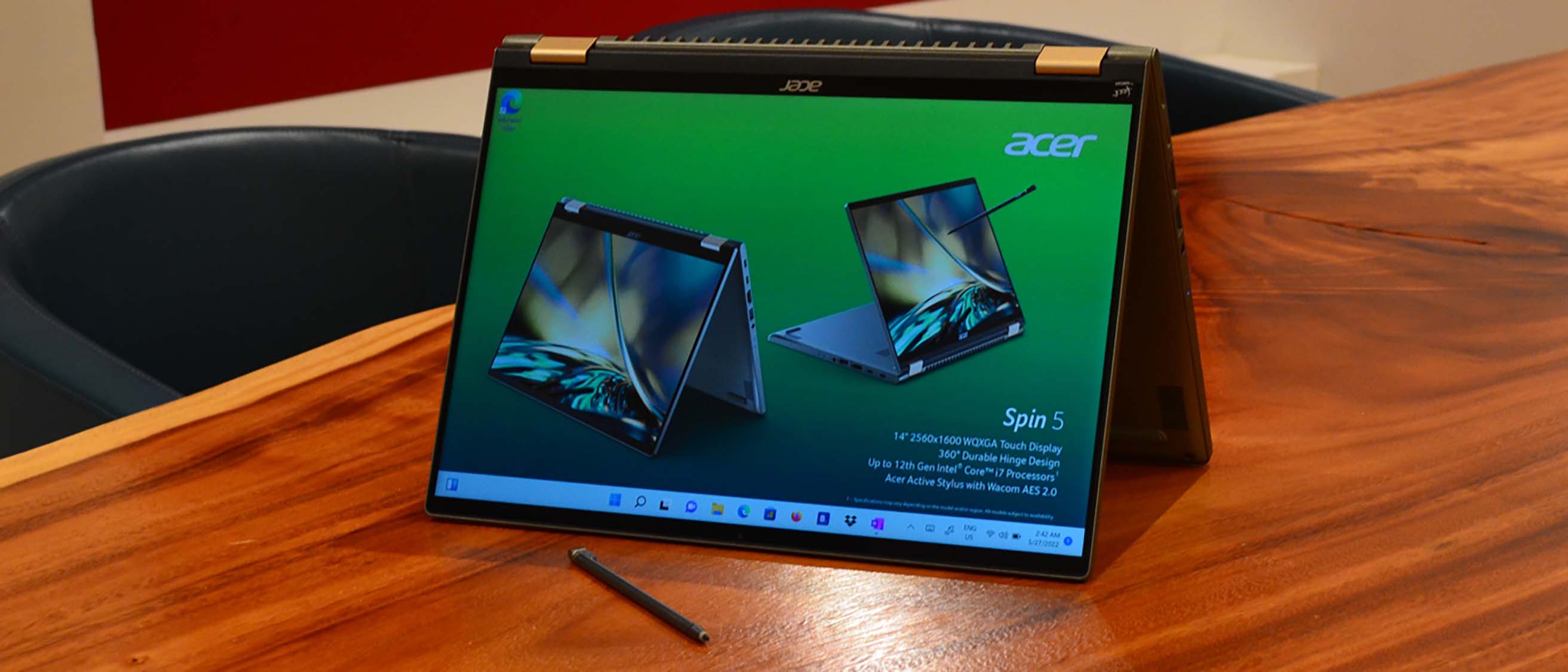 An Acer Spin 5 (2022) on a wood grain table