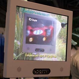 One of the outdoor TVs on display showed off a demo of the outdoor TV actually outdoors, while a steady stream of water was being sprayed on it.