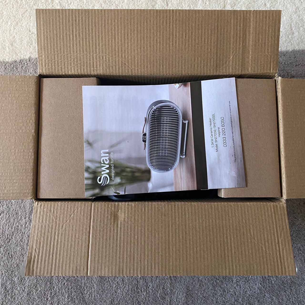 Open packaging of the Swan 1.5kW Retro Ceramic Heater