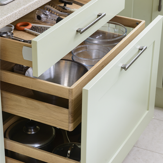 kitchen with drawers and serving bowls