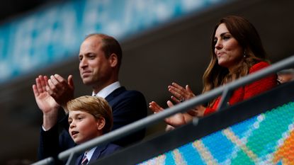 rince William, President of the Football Association and his son Prince George along with Catherine, Duchess of Cambridge applaud after the UEFA Euro 2020 Championship Round of 16 match between England and Germany at Wembley Stadium on June 29, 2021 in London, England.