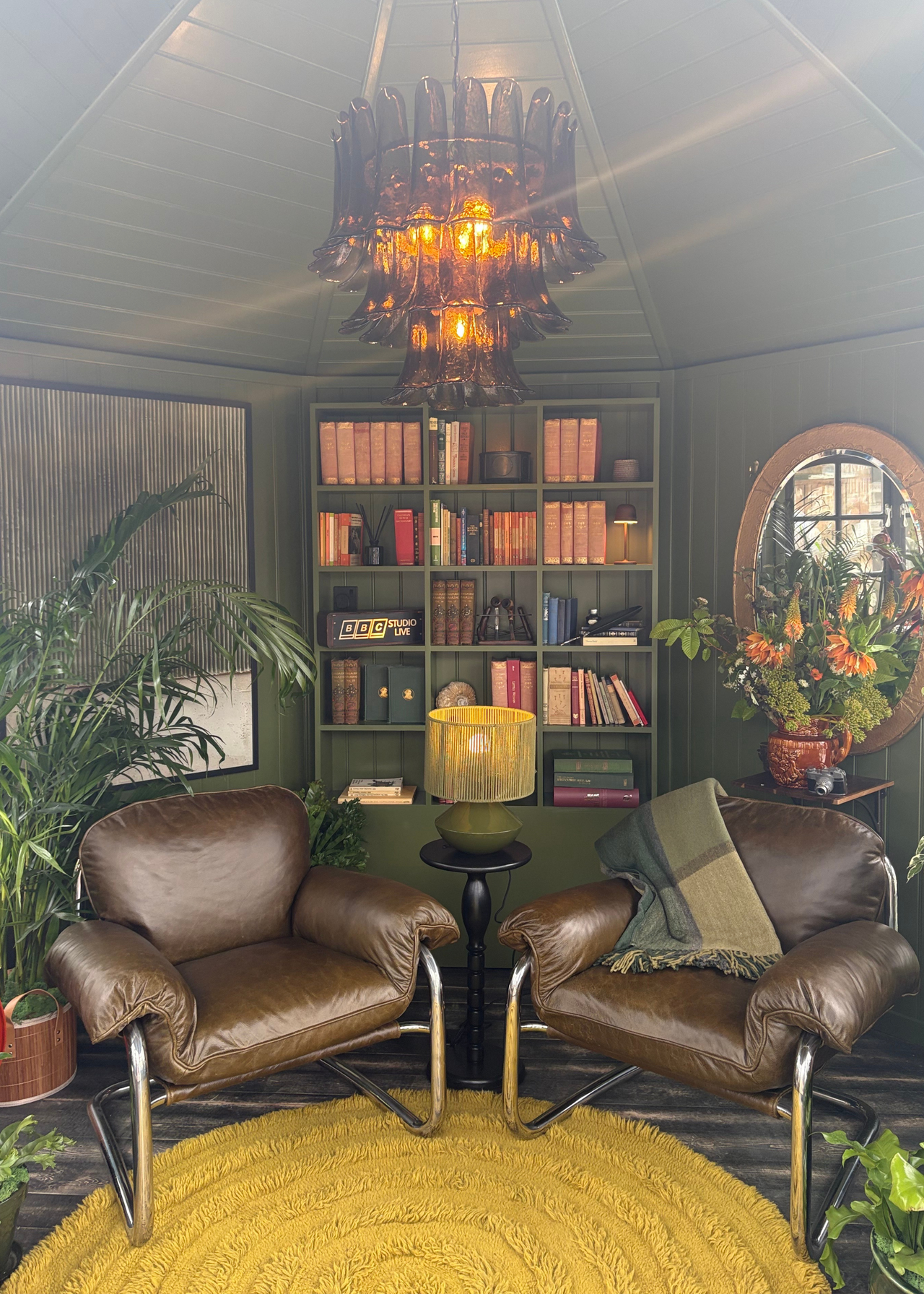 An outdoor shed with a reading and listening room at the Chelsea Flower Show 2026