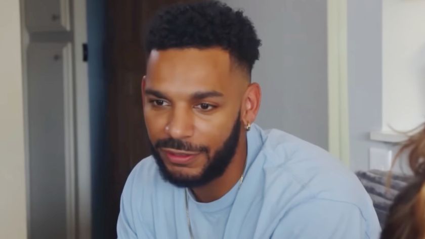 Jamal Menzies listening to his mother 