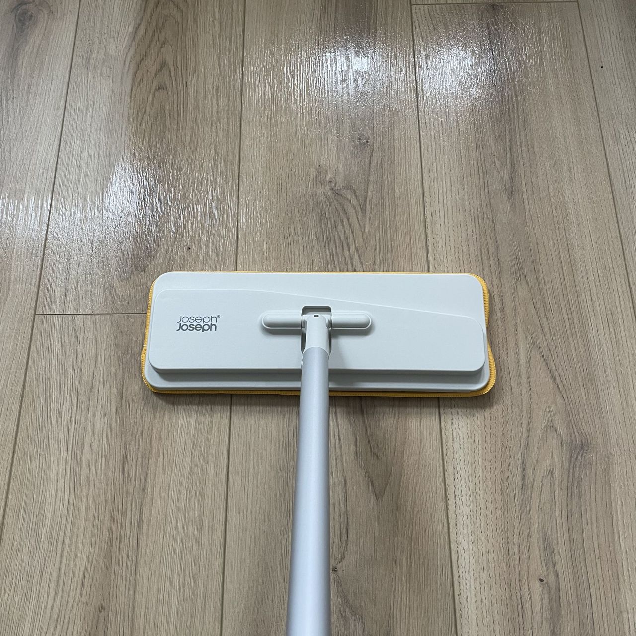 Using the Joseph Joseph UltraClean mop to clean wood-effect flooring