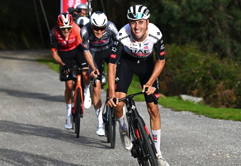 ALTO DA FOIA, PORTUGAL - FEBRUARY 20: Jan Christen of Switzerland and UAE Team Emirates - XRG attacks in the breakaway during the 51st Volta ao Algarve em Bicicleta, Stage 2 a 177.6km stage from Lagoa to Alto da Foia 869m on February 20, 2025 in Alto da Foia, Portugal. (Photo by Tim de Waele/Getty Images)