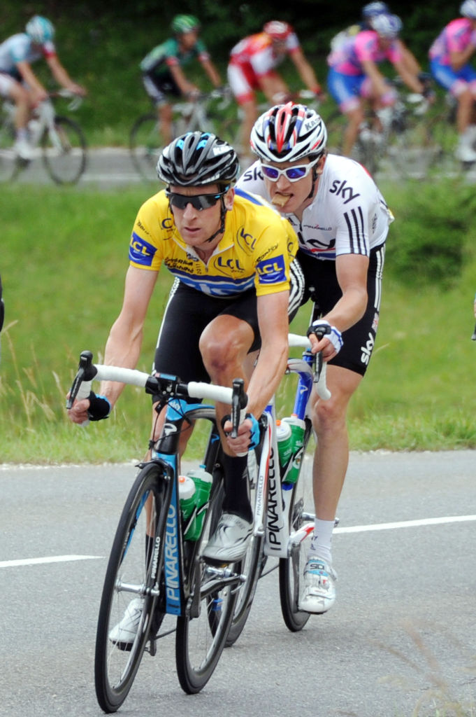 Britain's yellow jersey Bradley Wiggins (L) and British national cycling champion Geraint Thomas (R) ride during the fifth stage of the 63rd edition of the Criterium of Dauphine cycling race between Villars-Les-Dombes and Les Gets, on June 10, 2011, in Parc des Oiseaux, near Villars-Les-Dombes, French Alps. Kern won the fifth stage and Wiggins retained the leader's jersey. AFP PHOTO / PASCAL PAVANI (Photo credit should read PASCAL PAVANI/AFP via Getty Images)