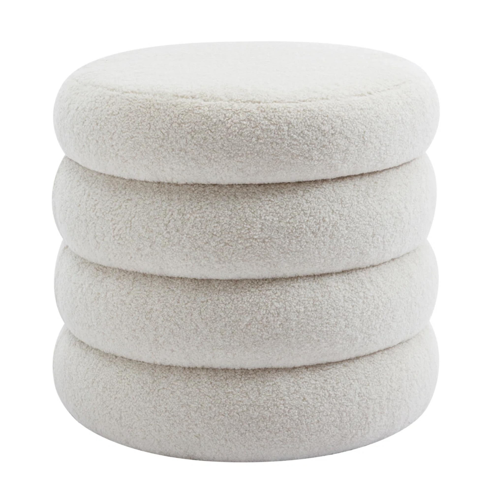 a white boucle ottoman with wavy side details