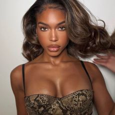 Image Lori Harvey wearing date-night-ready makeup.