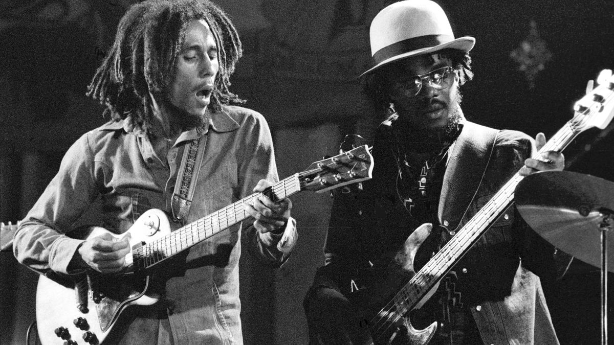 Bob Marley and Aston &#039;Family Man&#039; Barrett of The Wailers perform on stage at the Odeon, Birmingham, United Kingdom, 18 July 1975