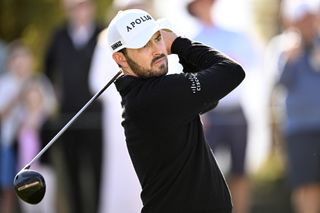 Patrick Cantlay hits a tee shot with a driver