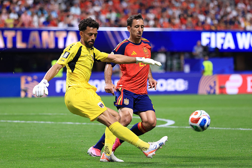 Vozinha #1 of Cabo Verde clears the ball under pressure from Mikel Oyarzabal #21 of Spain during the FIFA World Cup 2026 Group H match between Spain and Cabo Verde at Atlanta Stadium 