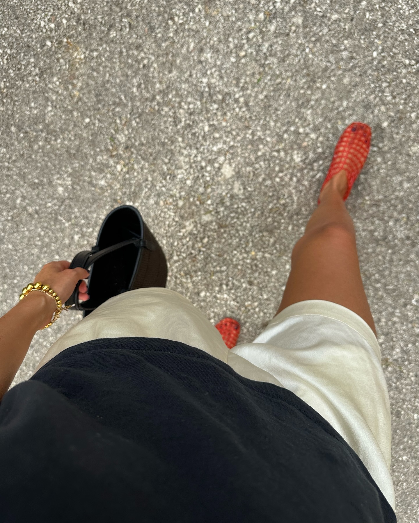 Influencer wears lattice ballet flats.