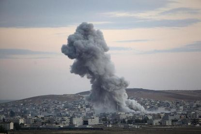 U.S. airdrops weapons, ammunition to Kurds in Kobani