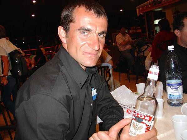 Igor Pugaci, the ex-pro for Saeco, poses with a bottle of "Igor" vodka.